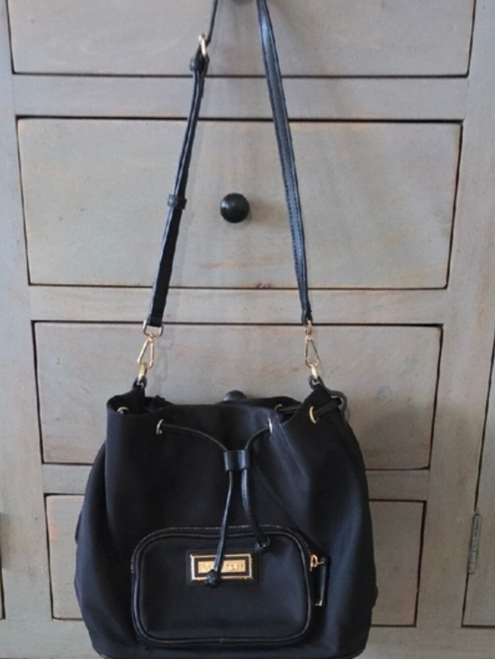 Calvin Klein Belfast Black Drawstring Nylon Bucket Bag with Front Pocket